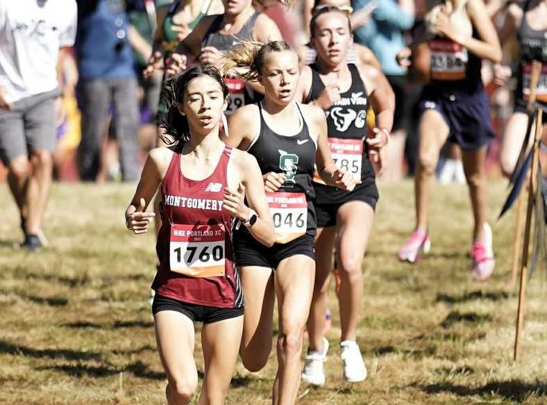Summit's Ella Thorsett (center) chases after Montgomery's Hanne Thomsen on Saturday at Blue Lake Park. (Photo by Jon Olson)