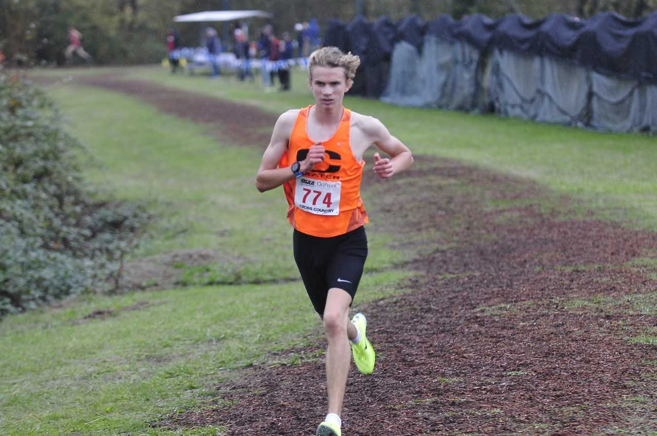 Crater's Tyrone Gorze finished the state course at Lane in 14:37.9, beating the record by seven seconds. (Photo by John Gunther)
