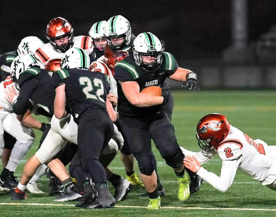 Estacada's Waylon Riedel rushed for 115 yards and one touchdowns on 25 carries Saturday night. (Photo by Jon Olson)