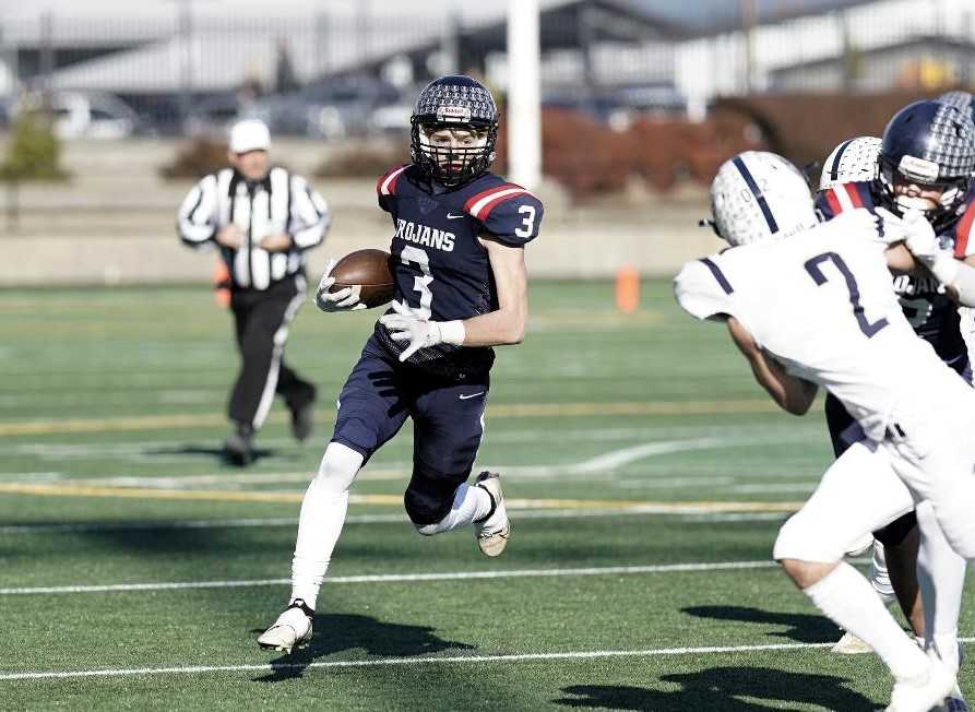 Kennedy's Owen Bruner (3) caught a touchdown pass in the first half of Saturday's win over Banks. (Photo by Jon Olson)