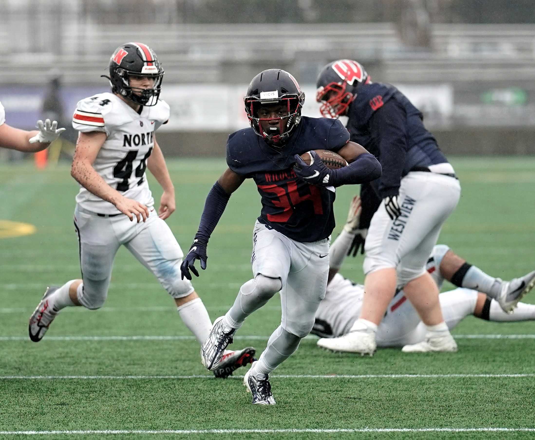 Jordan Fisher rushed for four of his five touchdowns in the second half Friday at Hillsboro Stadium. (Photo by Jon Olson)