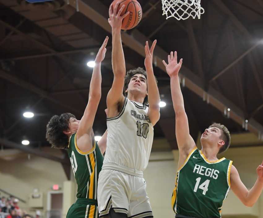 Salem Academy's Jackson Oglesby (10) dominated inside in Thursday's quarterfinal win over Regis. (Photo by Andre Panse)