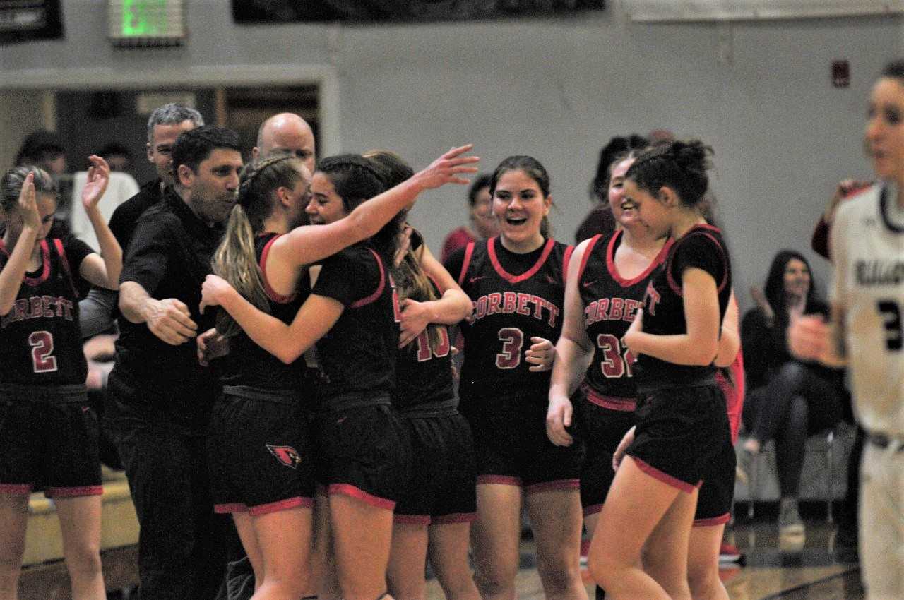 Corbett players celebrate their 50-40 win over Sutherlin in the 3A semifinals on Friday. (Photo by John Gunther)