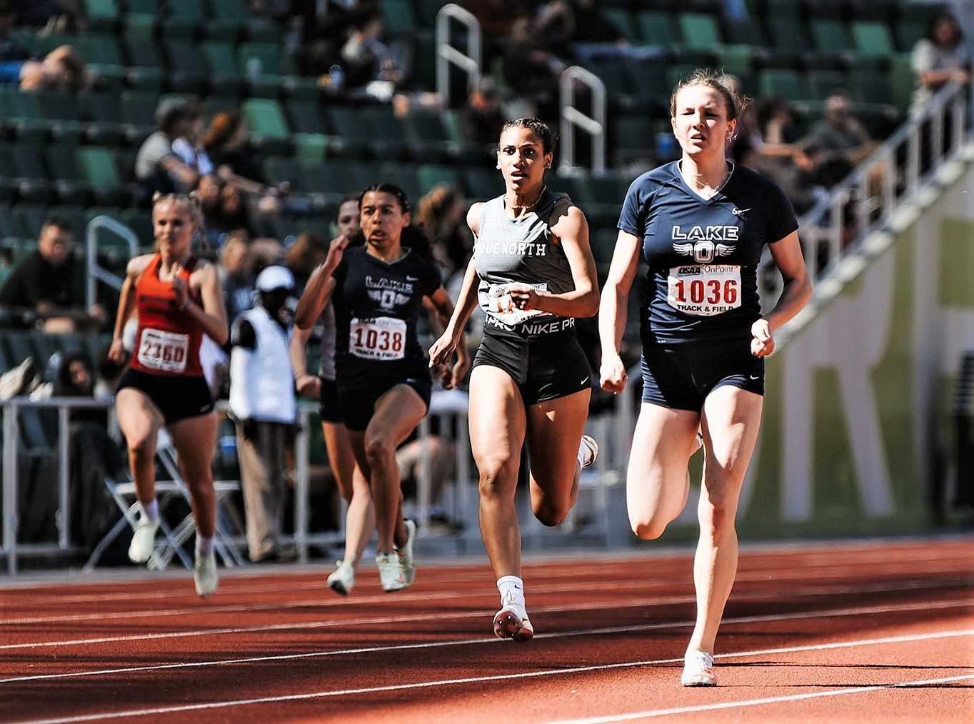 Lake Oswego's Mia Brahe-Pedersen (right) will try to improve on her state records this week. (Photo by Fanta Mithmeuangneua)