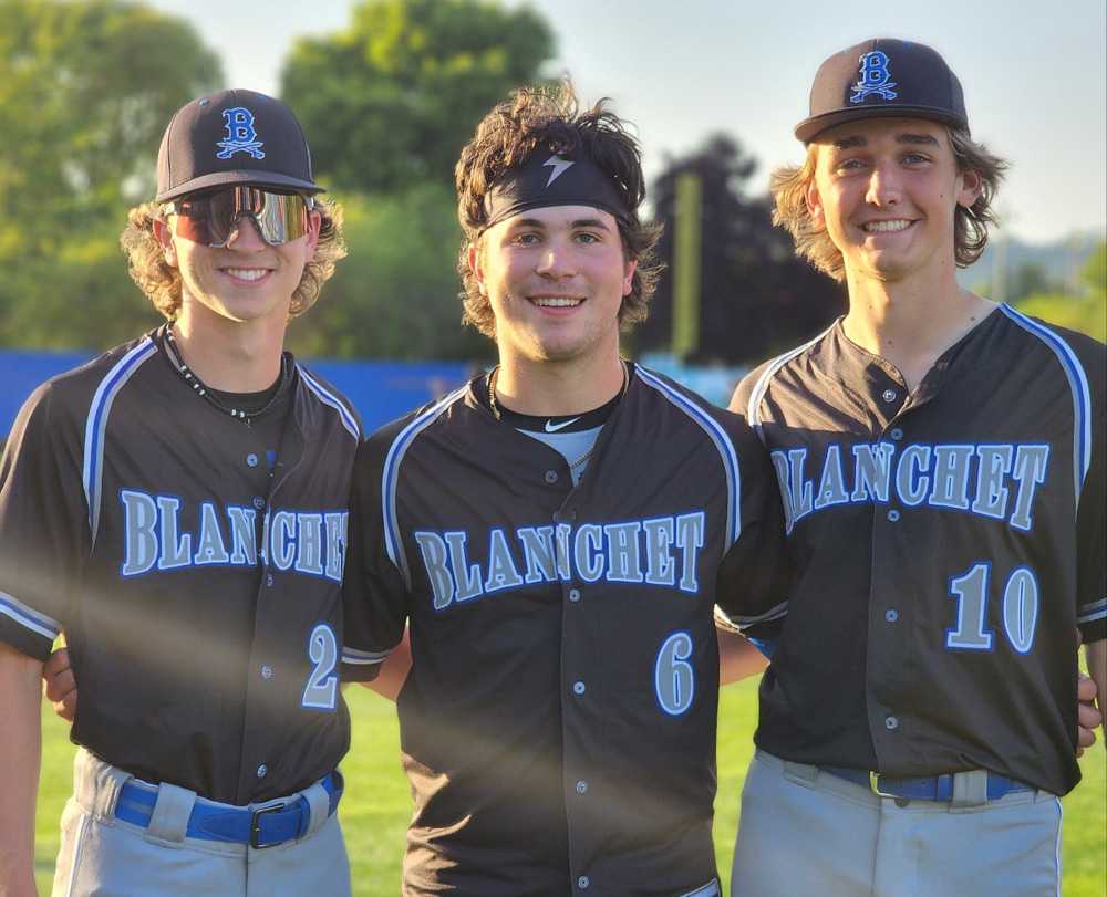Blanchet Catholic made history on Tuesday behind SP Drew Bartels (left), RP Spencer Kowalski (center) and C Carson McAnally