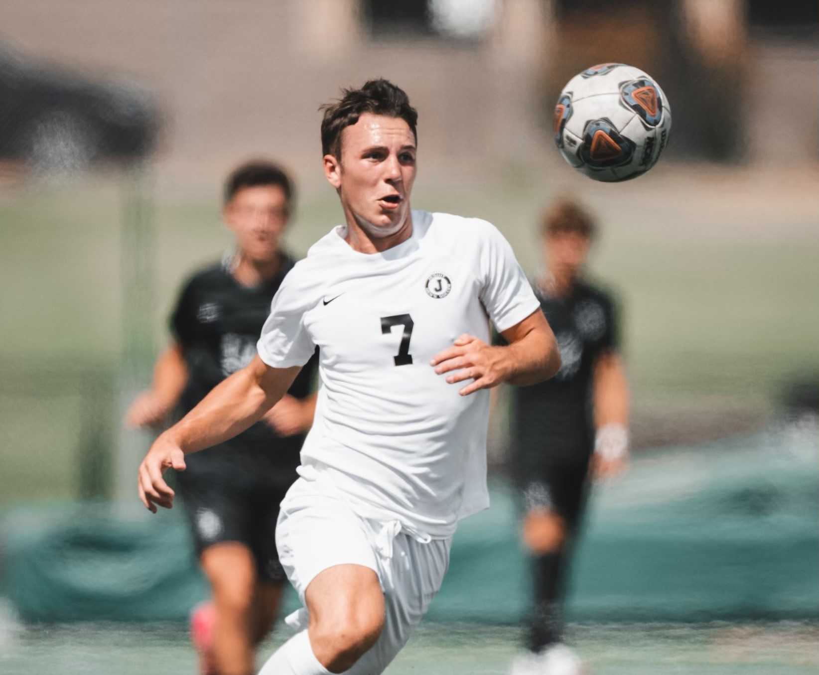 Jesuit junior Caden Hoppes chases after the ball during his team's season-opening win at Summit. (Photo by @picturethispdx)