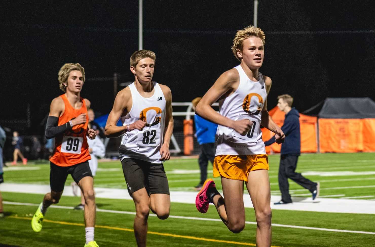 Josiah Tostenson (left) overtook Crater teammates Tayvon Kitchen (right) and Shaun Garnica on Thursday. (Photo by Molly Bermea)