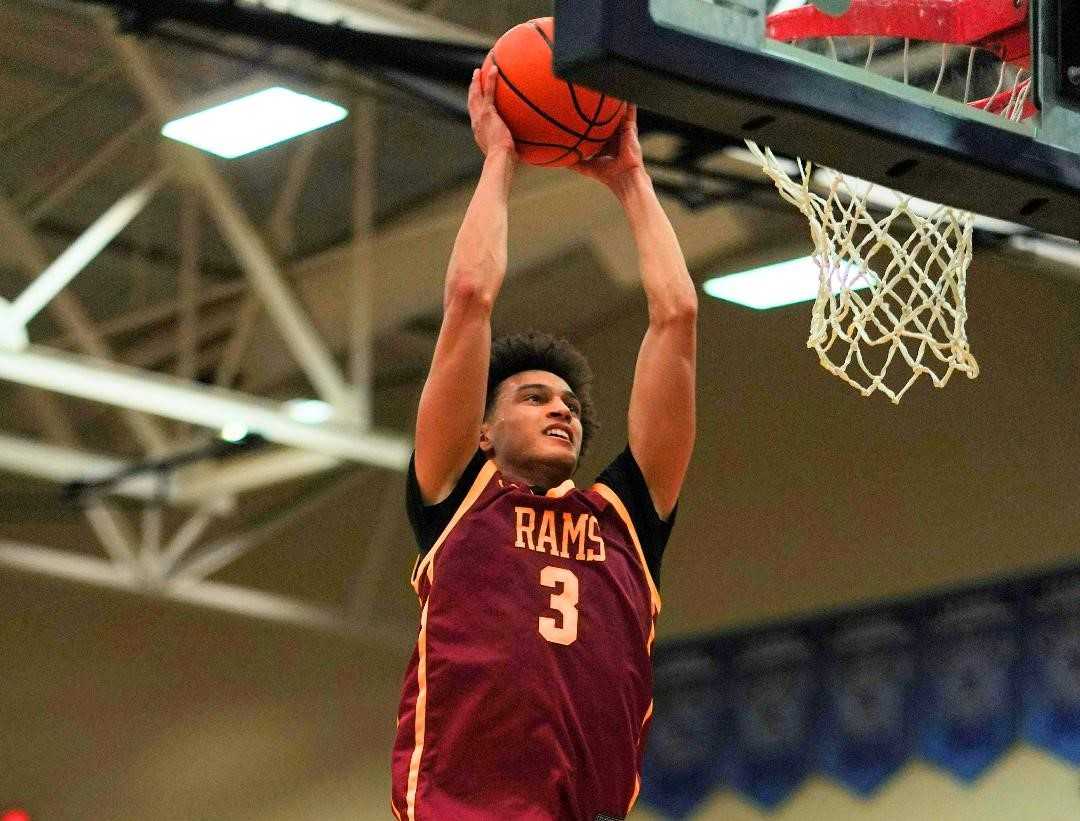 Central Catholic's Marley Zeller rises for two of his 22 points in Thursday's quarterfinal win over Barlow. (Photo by Jon Olson)