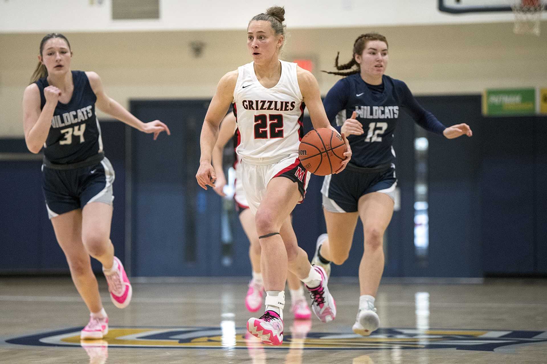 McMinnville junior point guard Macie Arzner is averaging 20.3 points and 15.2 rebounds. (Rusty Rae/News-Register)