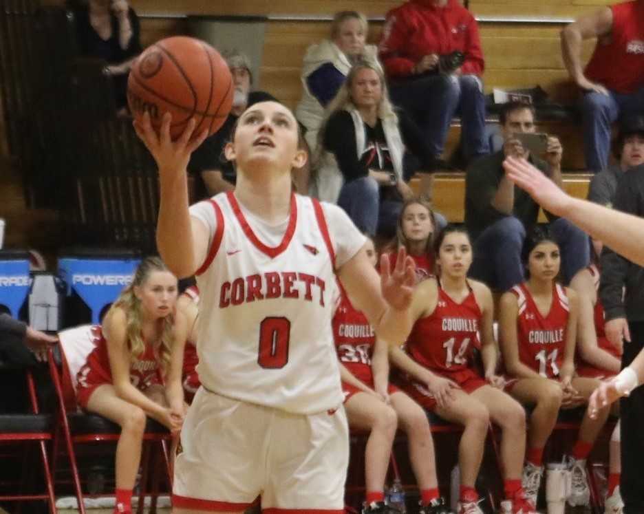 Corbett senior guard Ally Schimel, averaging 25.1 points, is driving to the basket more this season. (Photo by Norm Maves Jr.)