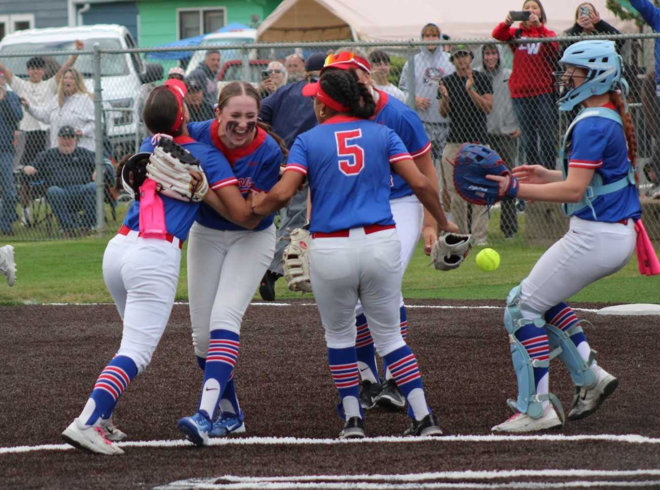 Lebanon players celebrate their 3-1 win over Mid-Willamette rival Dallas in a 5A softball semifinal. (Photo by Jeremy McDonald)