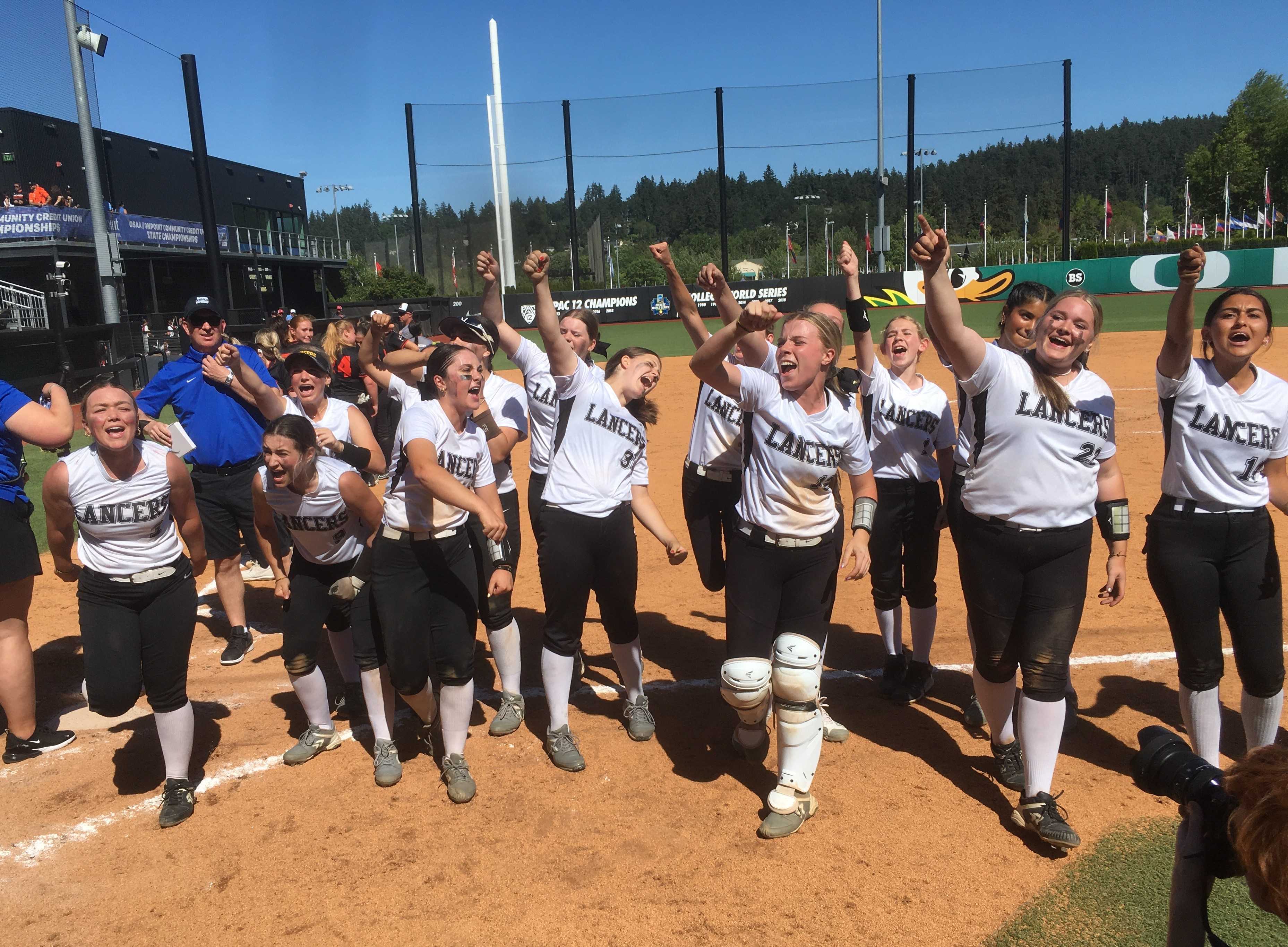 South Umpqua players cheer toward their fans after beating Scio in the 3A softball final Friday at the University of Oregon.