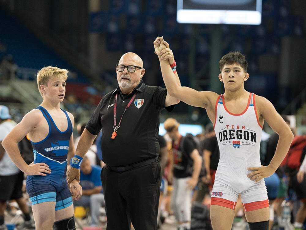 Archy De La Rosa made the round of 16 in freestyle before reaching the semifinals in Greco-Roman. (Photo by LangfordLens)