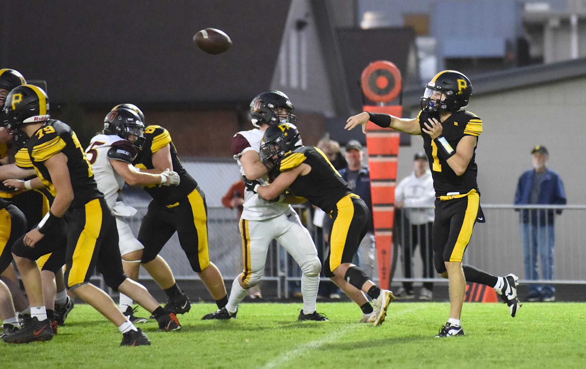 Philomath's Caleb Russell threw a school-record seven touchdown passes Friday against The Dalles. (Andy Cripe/Philomath News)