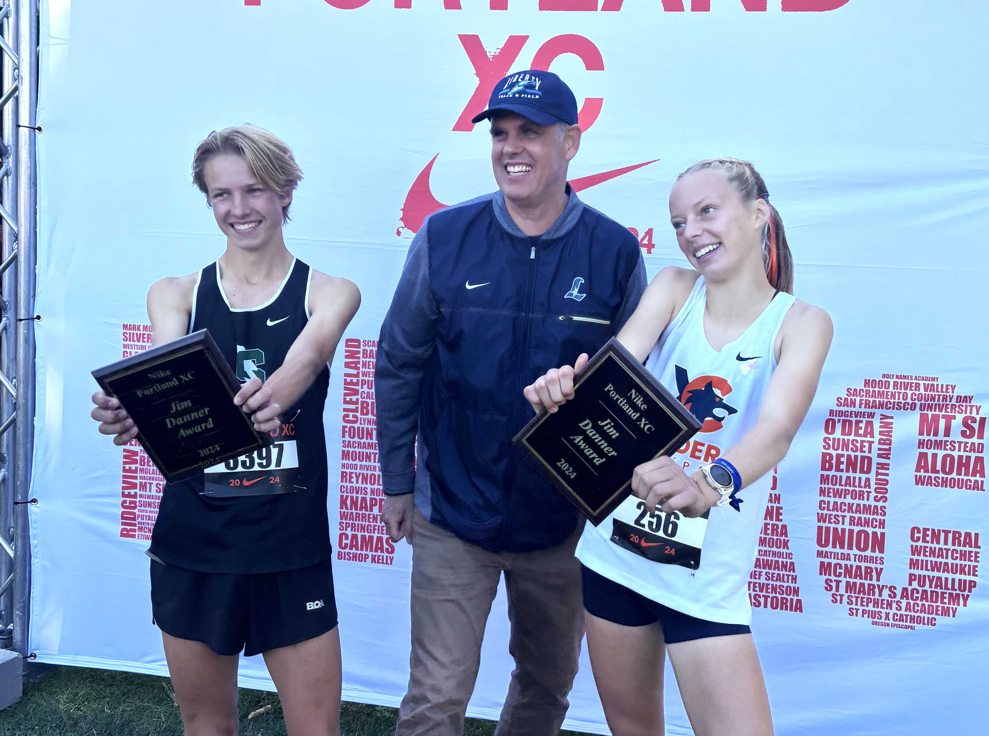 Caldera's Maddie Carney (right) and Summit's Hayden Boaz (left) pose with their Jim Danner Awards on Saturday. (Caldera HS)