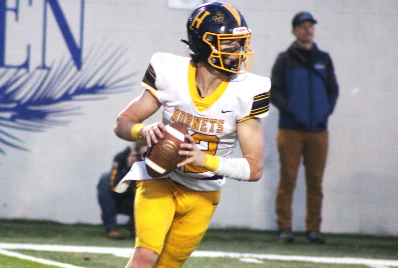 Henley quarterback Mark Carpenter ran for the go-ahead touchdown in overtime in Saturday's semifinal. (Photo by Jeremy McDonald)