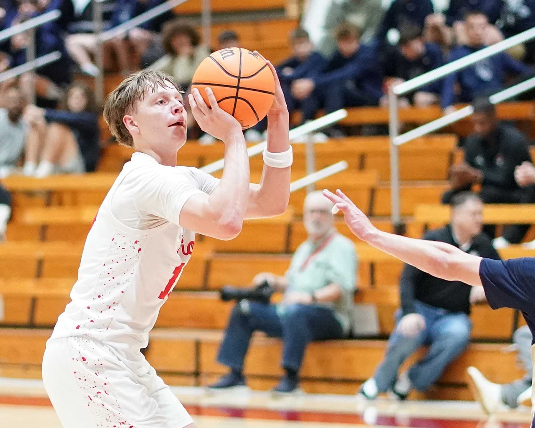 Oregon City's Gylan Payne, a 6-foot-5 senior guard, is leading 6A in scoring with a 23.9 average. (Photo by J.R. Olson)