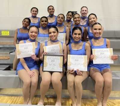 Sunset team members pose with certificates after their drill down success.