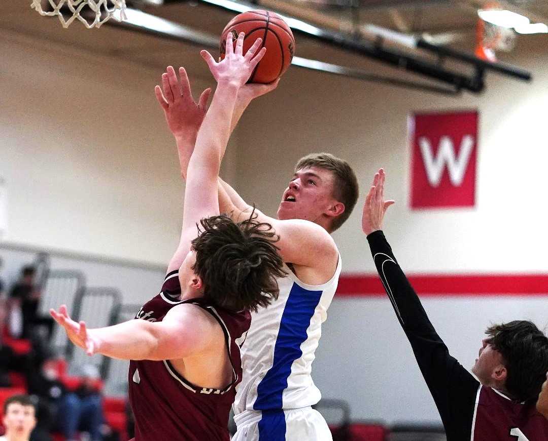 Cody Siegner, a 6-foot-7 senior, is averaging 23 points and 11 rebounds this season for unbeaten Crane. (Photo by J.R. Olson)