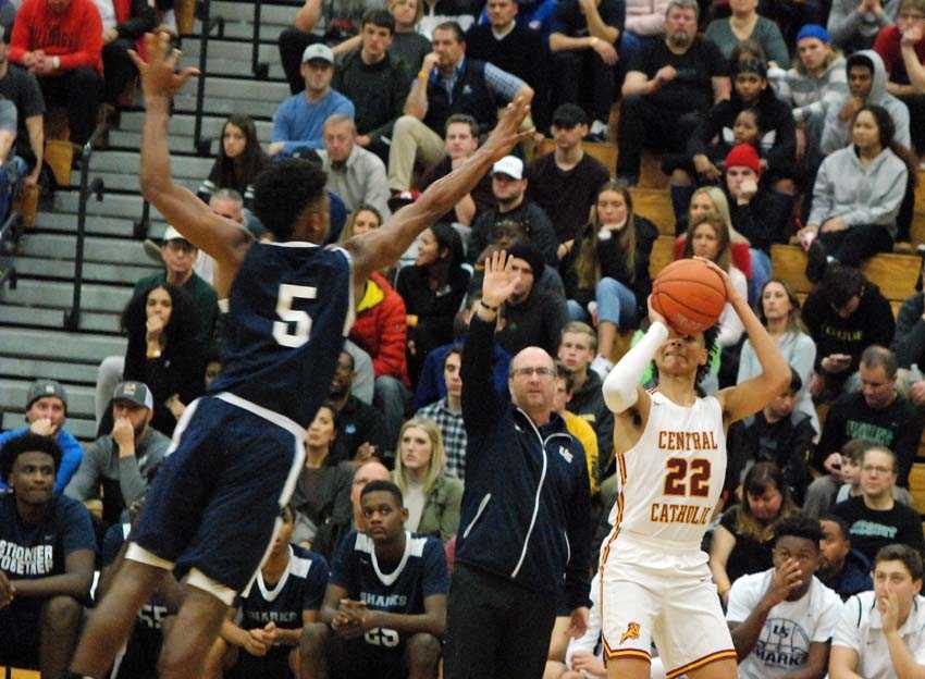 Isaiah Amato fires from long range for Central Catholic, which scored 27 points against University from behind the arc
