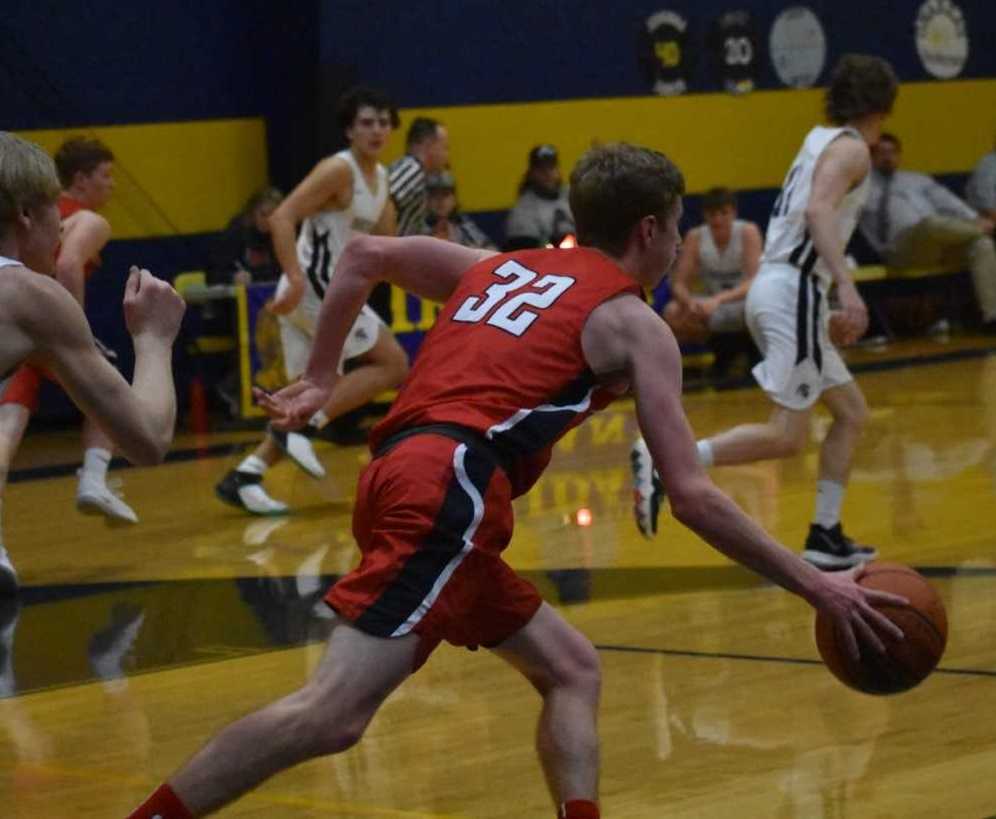 Kennedy's Luke Hall (32) scored a team-high 17 points Monday at Sheridan. (Photo by Jeremy McDonald)