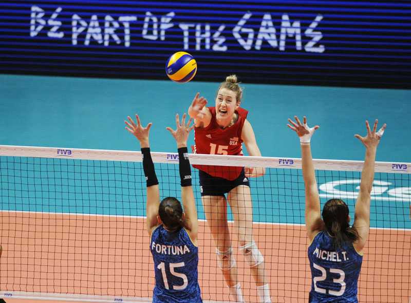 Kim Hill attacks from the back row for the US Women's National Team. Tokyo 2020 here she comes! Photo courtesy FIVB