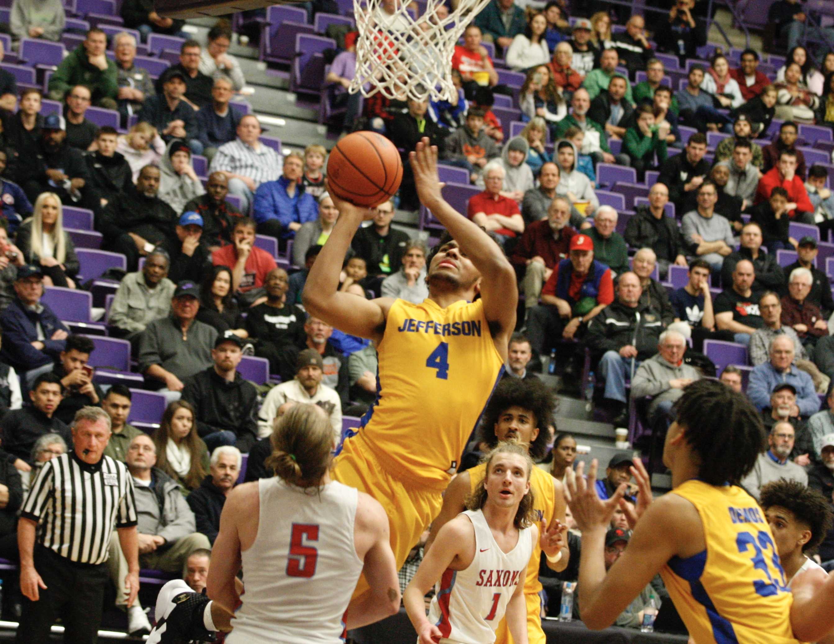 Jefferson's Nate Rawlins-Kibonge powers up over South Salem's Ryan Brown for two of his game-high 25 points.