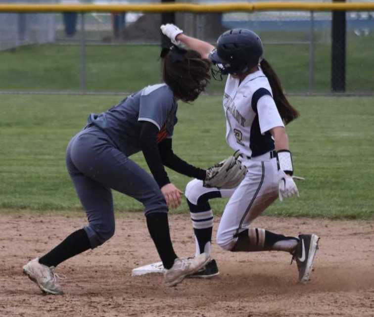 West Albany's Presley Jantzi, sliding under a tag at second base, had three hits Friday. (Photo by Jeremy McDonald)