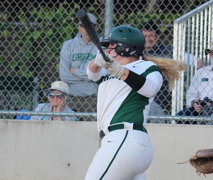 Sheldon's Olivia Schmidt goes yard. Photo by Tina Sams